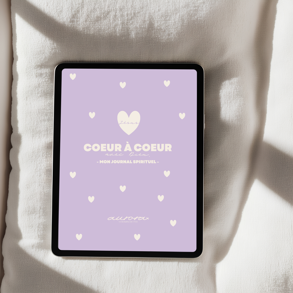 Cœur à Cœur - journal spirituel chrétien digital présenté sur iPad